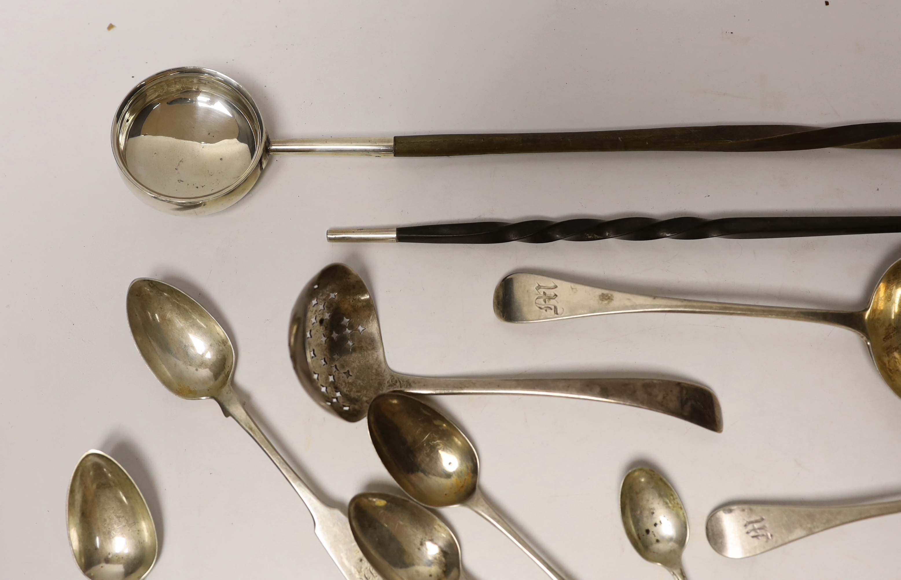 Two 19th century toddy ladles, including Scottish silver and a small quantity of assorted 19th century silver flatware, 15oz.